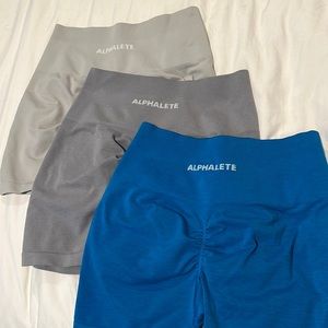 Bundle of 3 Alphalete Shorts , grey, light grey and blue! Size medium